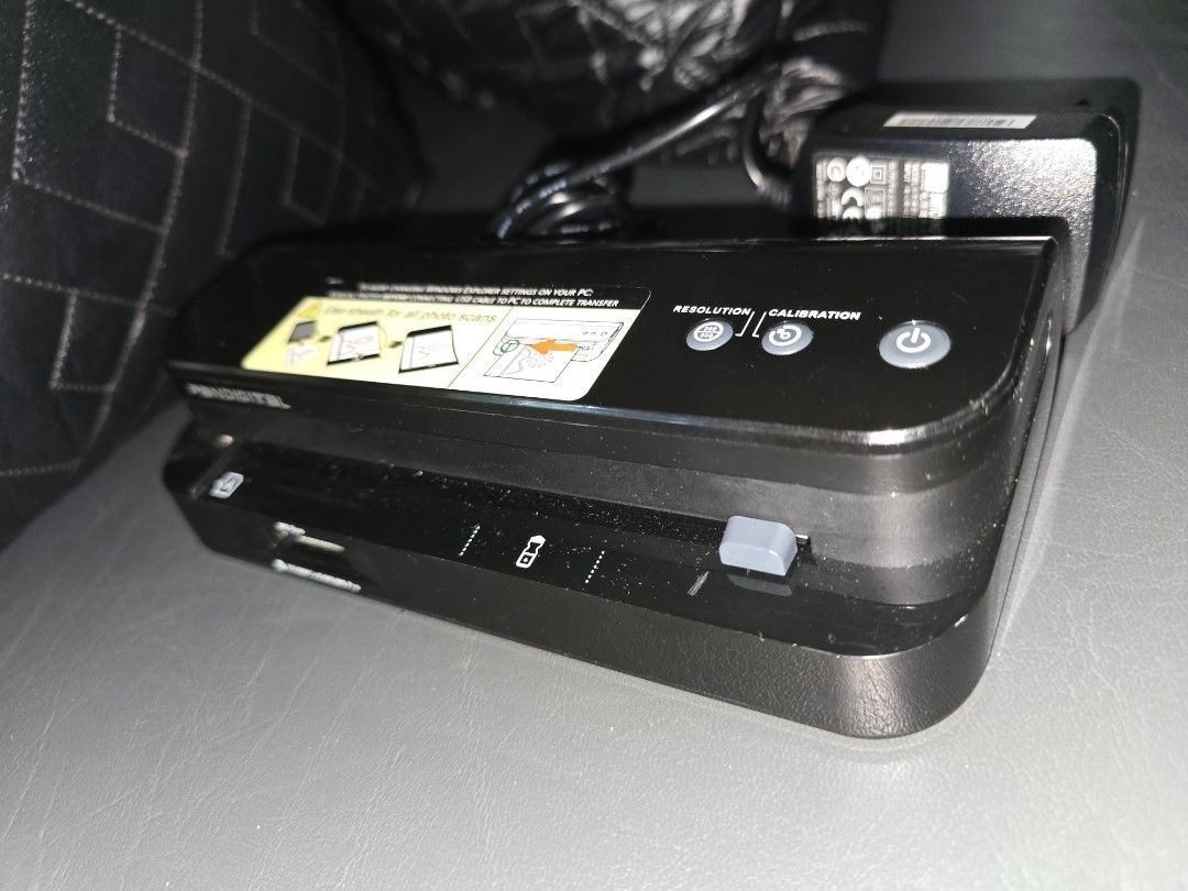 Pandigital Personal Scanner with Power Adapter (Category: Printers, Scanners & Copiers) located in Taguig. Submitted by jollero (Listing ID 1459145401, Image 1). Description: - Pandigital Personal Scanner - Includes Power Adapter - Built-in slots for SD/MMC/Pro Duo cards - Buttons for resolution and calibration settings - Ideal for digitizing photos and documents - Simple USB connection to PC for easy file transfer.