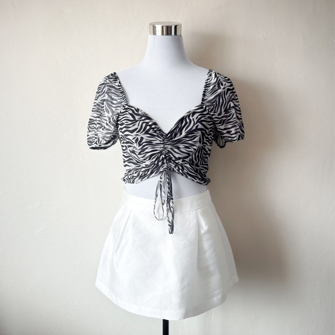 Pimkie Collection Zebra Print Ruched Top (Category: Others Tops) located in Antipolo. Submitted by rosywardrobe (Listing ID 1459252548, Image 1). Description: 🎀 MAKE READING A HABIT 🎀 • No order form, no reservation! • Strictly 1 day reservation • Payment first before order processing • No return, No exchange • Don’t make an offer if you’re not 100% sure • No shipping every weekends — PAYMENT CHANNELS — • GCash • Gotyme • Maya • BDO • BPI • Uni