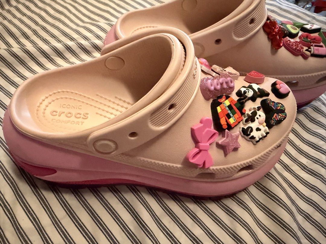 Pink Crocs with Charms (Category: Slippers and slides) located in Manila. Submitted by danielchuuu (Listing ID 1459278357, Image 2). Description: Rush Sale po Crocs Platform Size 6 Womens Bought in Canada All Jiblitz Original Worn twice only. Offer po ng Price thanks! - Adorable pink Crocs - Comes with a variety of fun charms (food, animals, and more!) - Easy slip-on design - Comfortable for all-day wear - Perfect for adding a playful touch to an
