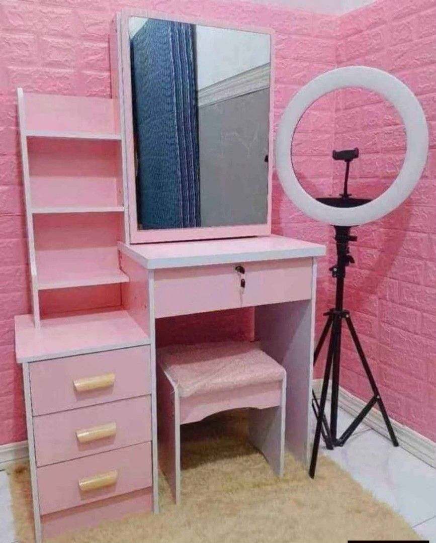 Pink Vanity Table with Mirror and Stool (Category: Tables & Sets) located in Caloocan City. Submitted by swiftflower_802790 (Listing ID 1459188788, Image 1). Description: - Adorable pink vanity set - Includes matching mirror and stool - Ample storage with drawers and shelves - Ideal for makeup, accessories, and beauty essentials - Perfect addition to any bedroom or dressing area - Simple and easy assembly - Get ready in style!.