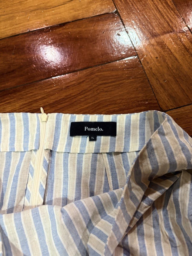 Pomelo Striped Mini Skirt XL (Category: Skirts) located in Carmona. Submitted by prelovedbyallia (Listing ID 1459213727, Image 3). Description: Pomelo Striped Mini Skirt in XL •Colors: Light Blue & Beige Stripes •Closure: Zipper at the back •Occasion: Great for casual wear or dressing up • RFS: Too big! Only worn once MOP: GCash, BDO, or BPI MOD: J&T or Lalamove (shipping fee is shouldered by the buyer) Reminders: • Please manage your expectation