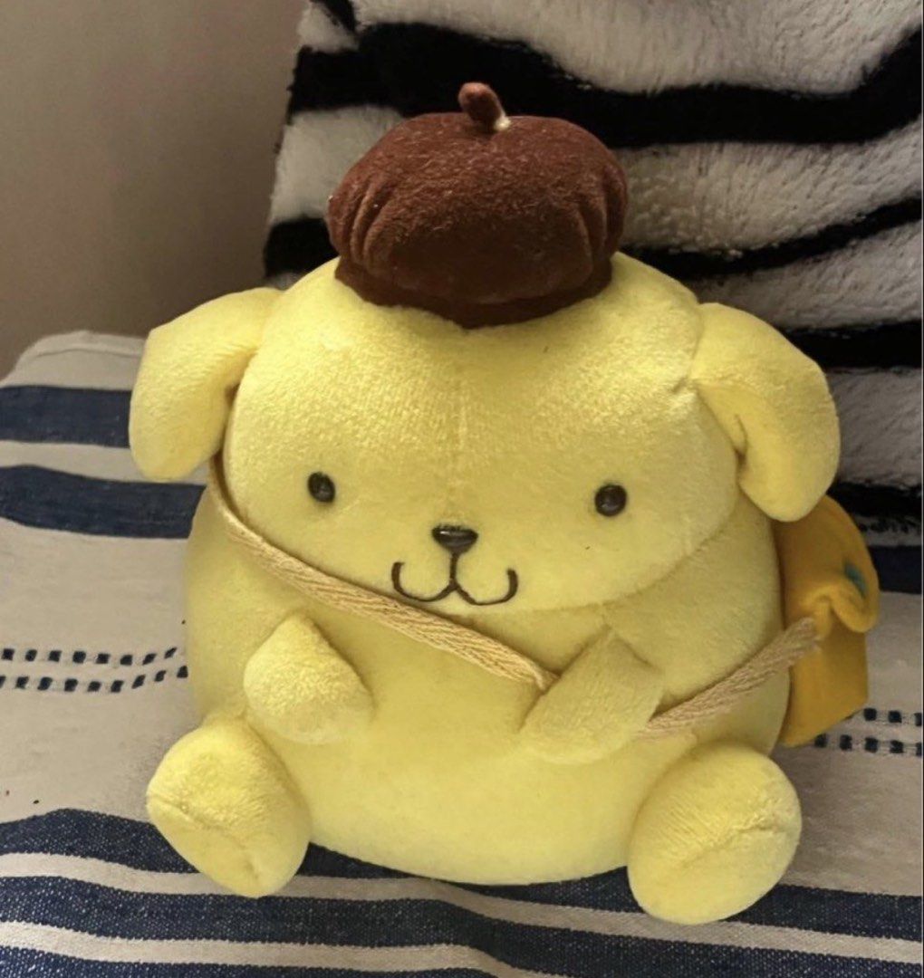 Pompompurin with sling bag plush (Category: Plushies & Soft Toys) located in Paranaque City. Submitted by bonsaiart (Listing ID 1459211483, Image 2). Description: Pre owned Good condition 730+sf Payment via GCASH or paymaya No to meetup No to cop / cod Shipping via j&t only.