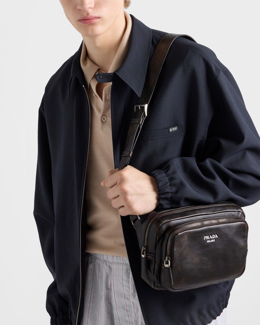 ⚜️Prada - Distressed Nappa leather shoulder bag (Category: Luxury Bags & Wallets) located in Makati City. Submitted by 90sangel (Listing ID 1459264141, Image 2). Description: Chocolate brown, but make it Prada. 🤎✨ Rich, timeless, and effortlessly luxurious—the kind of bag that makes every outfit look expensive. 👜🤎 Adjustable leather shoulder strap with buckle (90–100 cm) * Hot-stamped logo * Zipper closure * Bag charm ring * External & interna