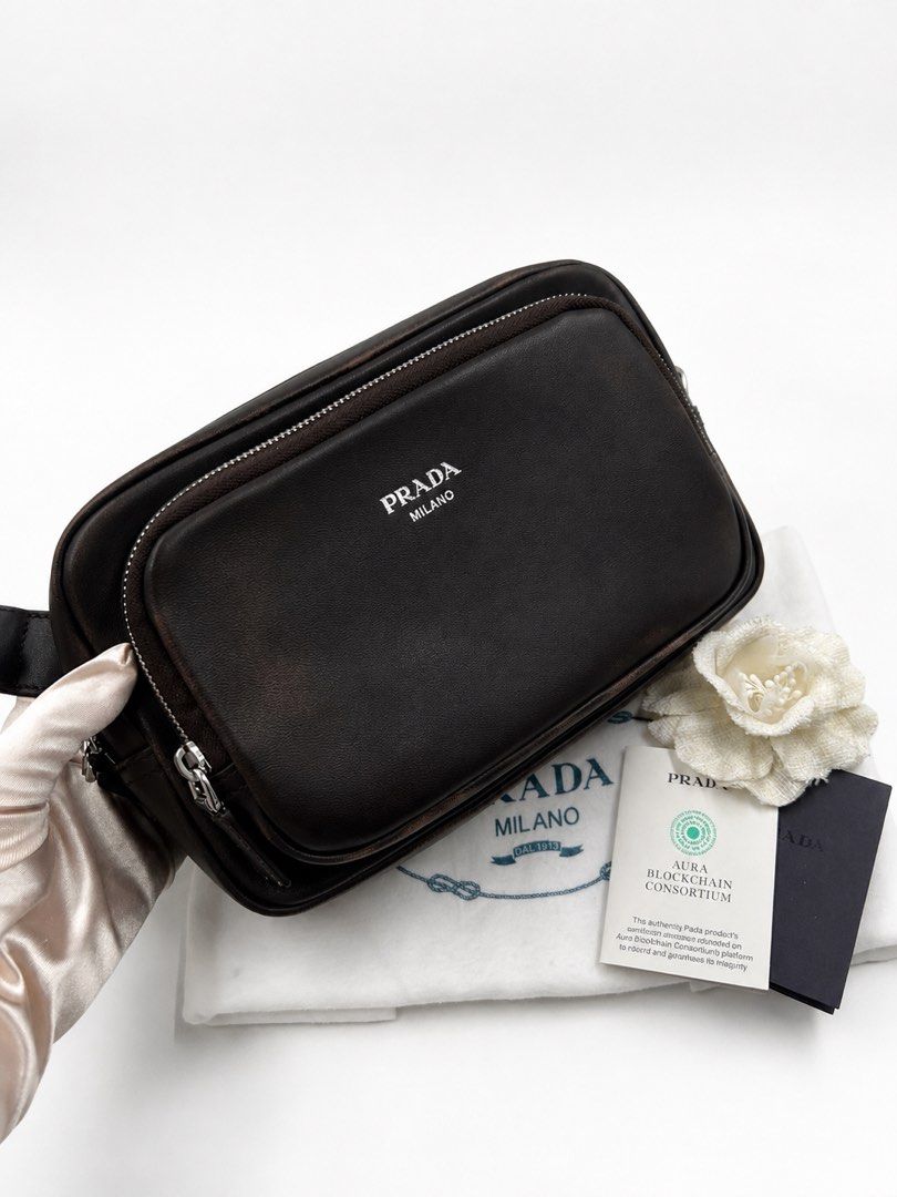 ⚜️Prada - Distressed Nappa leather shoulder bag (Category: Luxury Bags & Wallets) located in Makati City. Submitted by 90sangel (Listing ID 1459264141, Image 3). Description: Chocolate brown, but make it Prada. 🤎✨ Rich, timeless, and effortlessly luxurious—the kind of bag that makes every outfit look expensive. 👜🤎 Adjustable leather shoulder strap with buckle (90–100 cm) * Hot-stamped logo * Zipper closure * Bag charm ring * External & interna