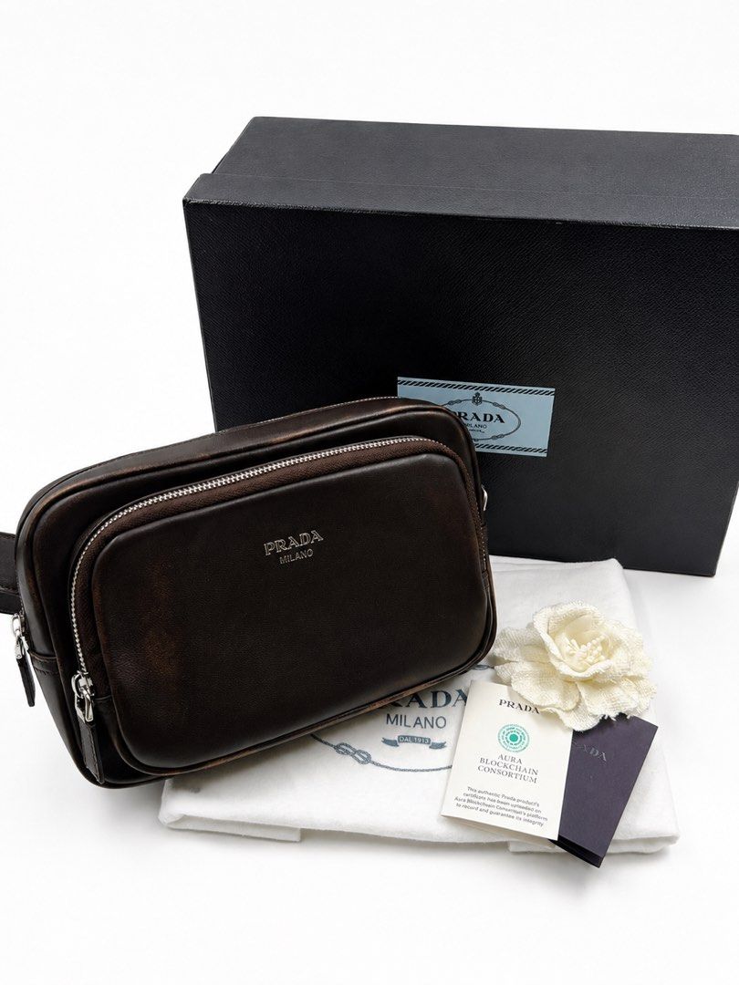 ⚜️Prada - Distressed Nappa leather shoulder bag (Category: Luxury Bags & Wallets) located in Makati City. Submitted by 90sangel (Listing ID 1459264141, Image 1). Description: Chocolate brown, but make it Prada. 🤎✨ Rich, timeless, and effortlessly luxurious—the kind of bag that makes every outfit look expensive. 👜🤎 Adjustable leather shoulder strap with buckle (90–100 cm) * Hot-stamped logo * Zipper closure * Bag charm ring * External & interna