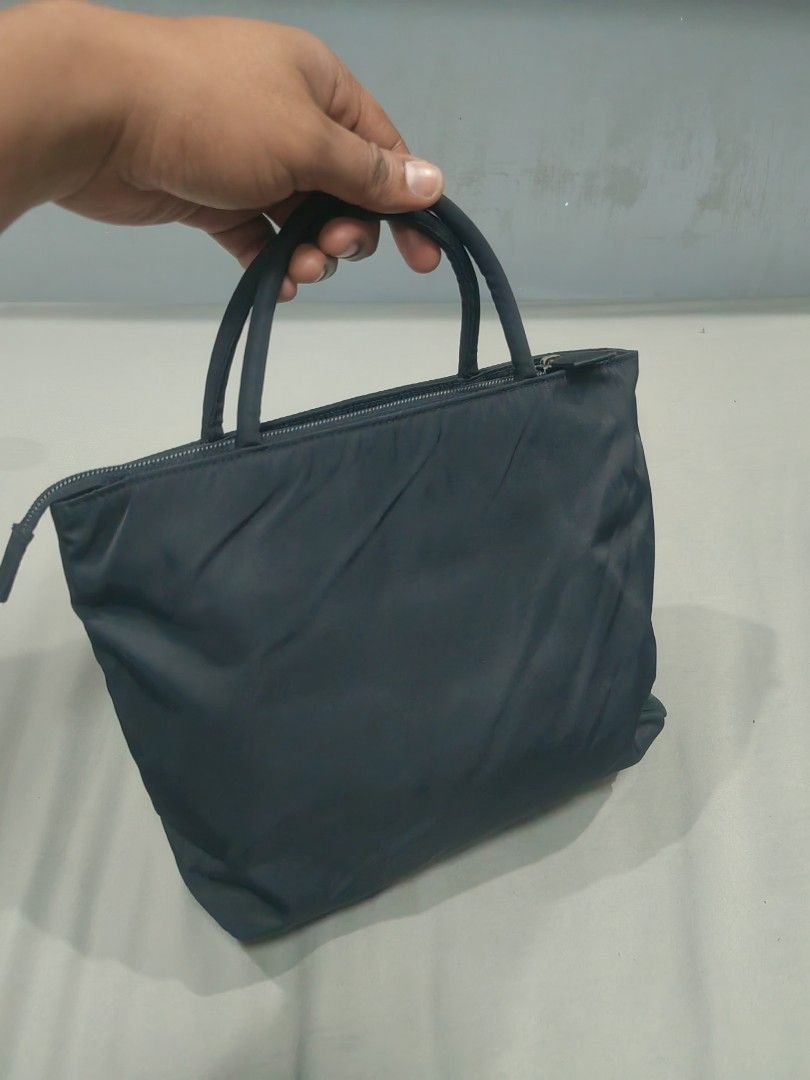 Prada nylon small tote bag (Category: Luxury Bags & Wallets) located in Santa Rosa. Submitted by _ba_mo_si_ (Listing ID 1459221263, Image 3). Description: Bag only Plus sf.