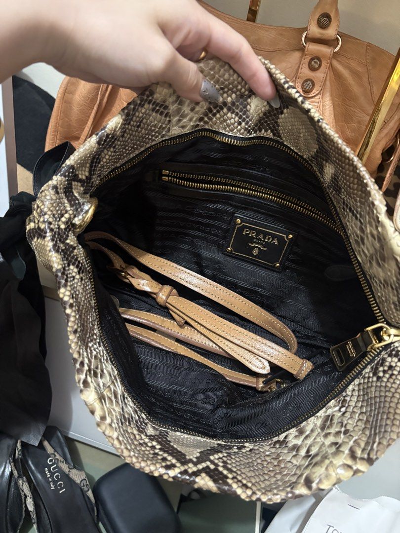 Prada Python Vintag Bag (Category: Luxury Bags & Wallets) located in Las Pinas. Submitted by xoxuryam (Listing ID 1459242487, Image 2). Description: - super pretty - can remove the strap - can be clutch and sling bag - guaranteed authentic .