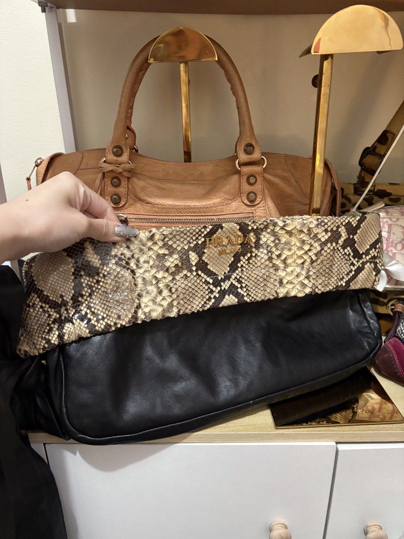 Prada Python Vintag Bag (Category: Luxury Bags & Wallets) located in Las Pinas. Submitted by xoxuryam (Listing ID 1459242487, Image 1). Description: - super pretty - can remove the strap - can be clutch and sling bag - guaranteed authentic .