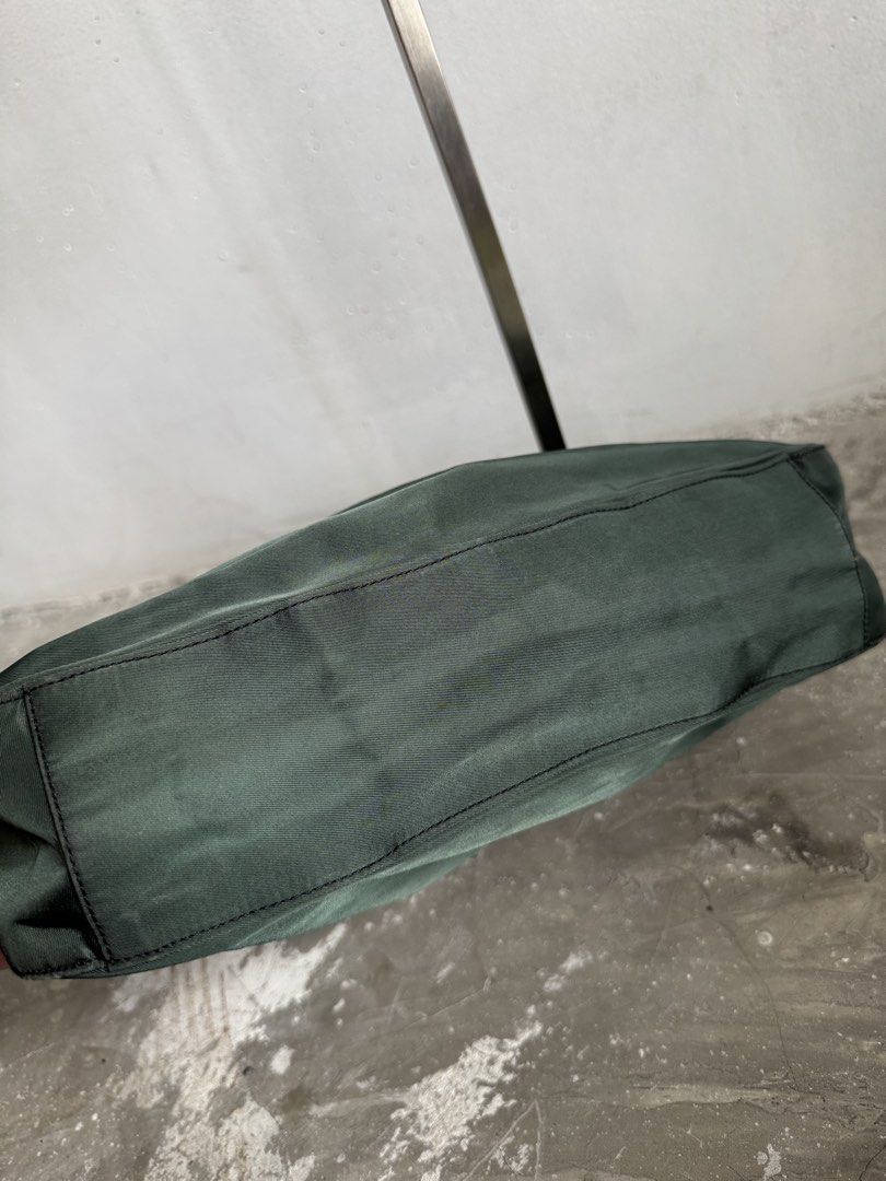 Prada tessuto green nylon (Category: Luxury Bags & Wallets) located in Quezon City. Submitted by streetgallerygarments (Listing ID 1459231885, Image 3). Description: Prada Vintage Tessuto Green Nylon Shoulder Bag Condition: 9/10 Issue handle Courier Jnt/Lbc/lalamove Dhl express.