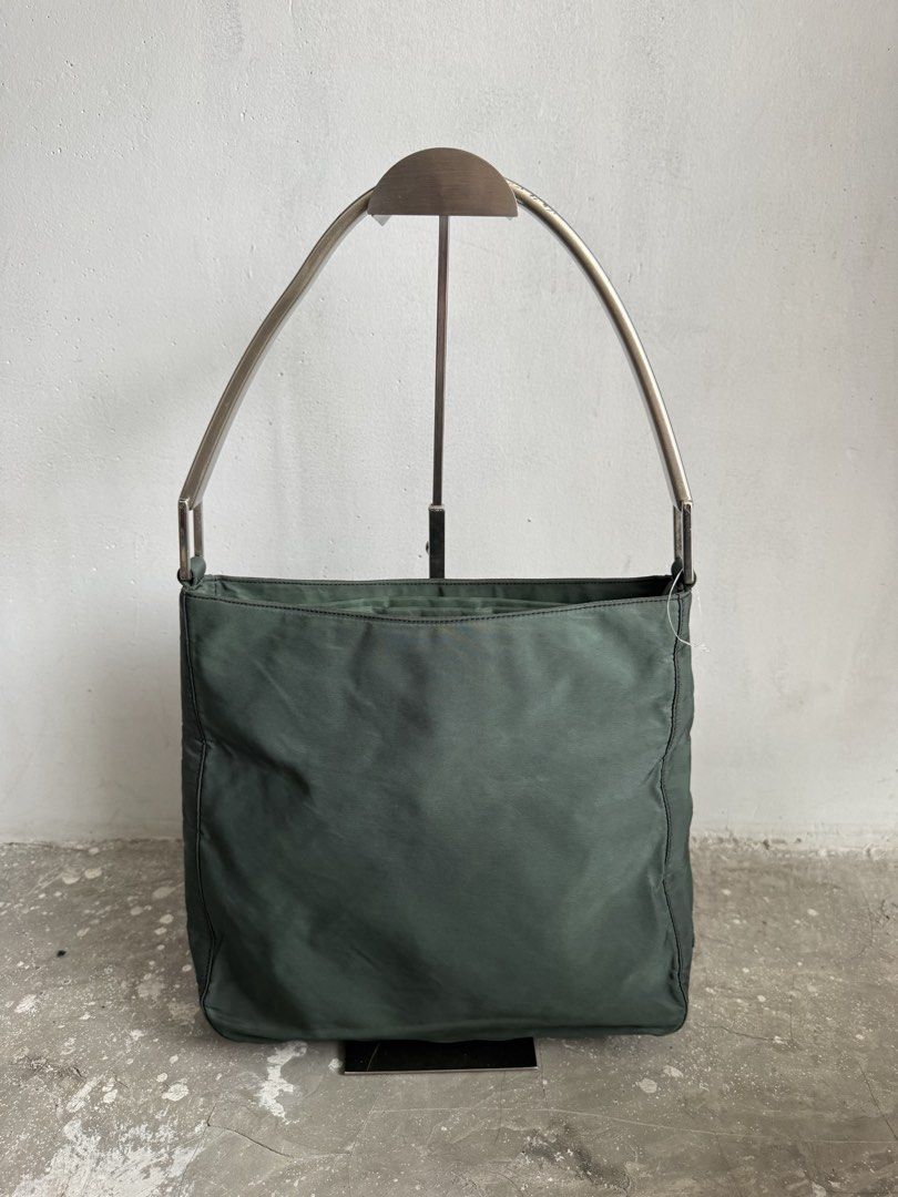 Prada tessuto green nylon (Category: Luxury Bags & Wallets) located in Quezon City. Submitted by streetgallerygarments (Listing ID 1459231885, Image 2). Description: Prada Vintage Tessuto Green Nylon Shoulder Bag Condition: 9/10 Issue handle Courier Jnt/Lbc/lalamove Dhl express.