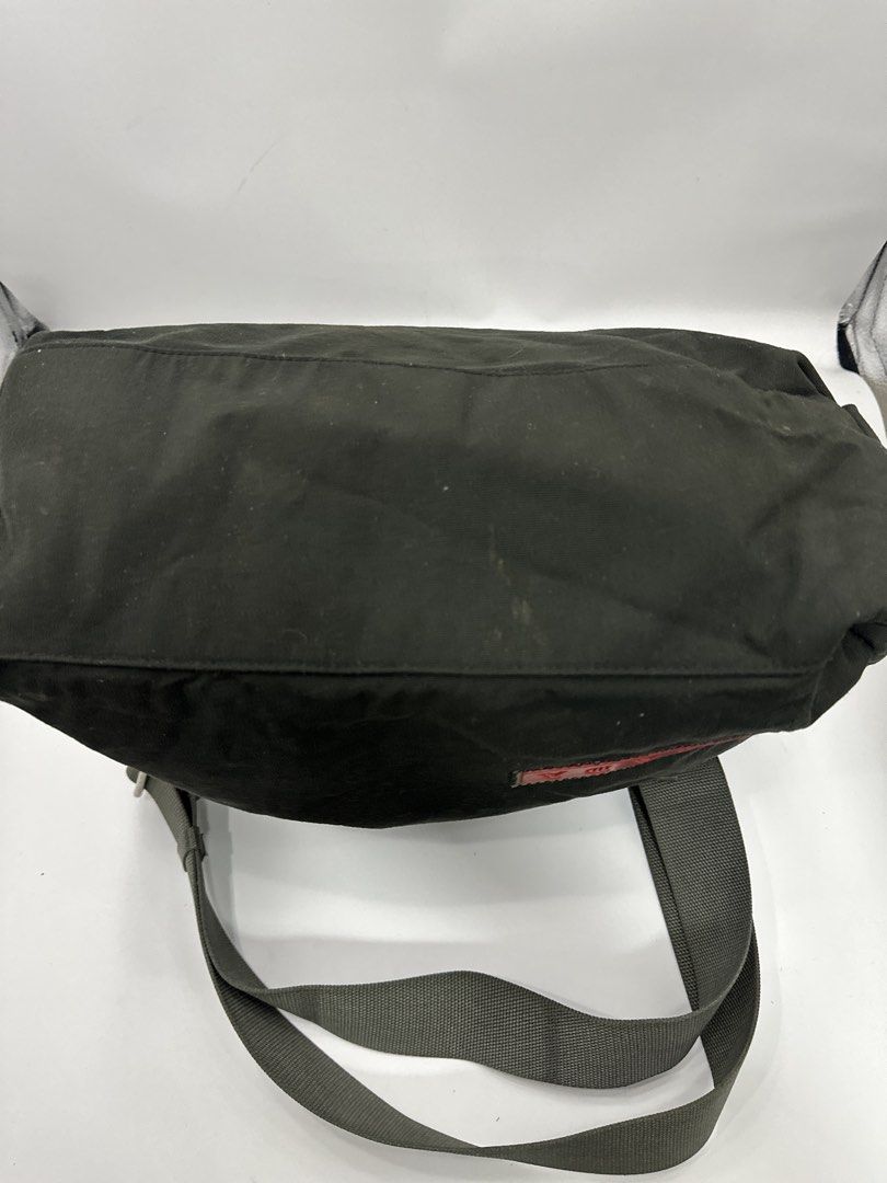 Prada Tessuto Shoulder Bag Dark Green (Category: Luxury Bags & Wallets) located in Baguio. Submitted by luxukayukay (Listing ID 1459242731, Image 3). Description: - Authentic Prada shoulder bag - Made in Italy - 100% Polyamide exterior - 100% Nylon lining - Red Prada logo tab - Adjustable strap - Interior zip pocket - Ideal for everyday use.