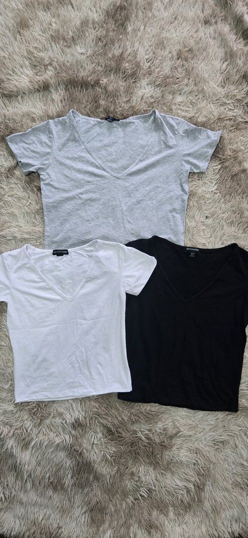 PrettyLittleThing V-Neck Basic Tees (Black, White, Grey) (Category: Shirts) located in Antipolo. Submitted by mel.hernandez (Listing ID 1459203706, Image 2). Description: - Bundle of 3 PrettyLittleThing V-neck tees - Colors: Black, White, Light Grey - Material: Soft and comfortable - Perfect for everyday wear or layering.
