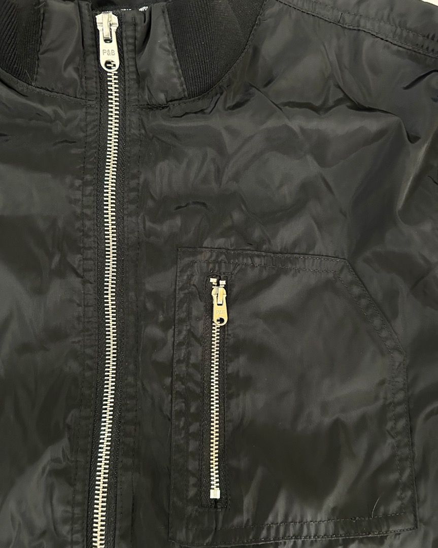 MARKDOWN!! Pull & Bear Black Bomber Jacket Size L (Category: Coats, Jackets and Outerwear) located in Quezon City. Submitted by strangesuitcase (Listing ID 1459212816, Image 3). Description: - Brand: Pull & Bear - Style: Bomber Jacket - Color: Black - Size: L - Features: Zip-up front, zippered chest pocket - Details: Ribbed collar, cuffs, and hem - Styling: Great for casual layering and easy to style..