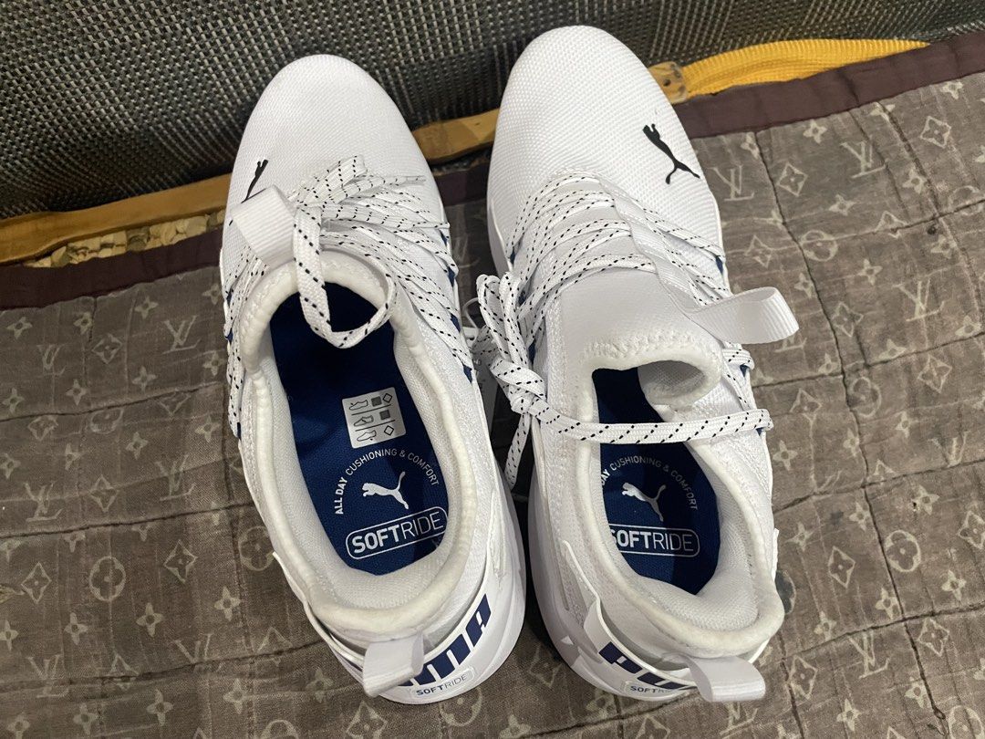 Puma Softride White Running Shoes (Category: Sneakers) located in Quezon City. Submitted by matmultiwatchban (Listing ID 1459254938, Image 2). Description: - White Puma Softride running shoes - Comfortable cushioning for all-day wear - Ideal for everyday use or light workouts - Size: 10 - Excellent bargain opportunity No box Antipolo area.