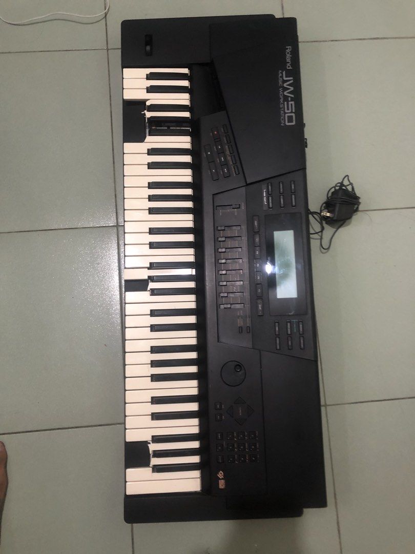 Roland JW-50 61keys Synthesizer needs repairs (Category: Musical Instruments) located in Quezon City. Submitted by markgolveo (Listing ID 1459124235, Image 2). Description: Roland JW-50 61keys Synthesizer needs repairs Has defects read properly please- - for repairs or parts out selling as is declared of its issues -All keys works and outputs sounds when pressed - all buttons and knobs works properly -pitch knob works -contrast display knob works