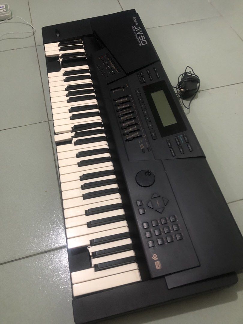 Roland JW-50 61keys Synthesizer needs repairs (Category: Musical Instruments) located in Quezon City. Submitted by markgolveo (Listing ID 1459124235, Image 3). Description: Roland JW-50 61keys Synthesizer needs repairs Has defects read properly please- - for repairs or parts out selling as is declared of its issues -All keys works and outputs sounds when pressed - all buttons and knobs works properly -pitch knob works -contrast display knob works