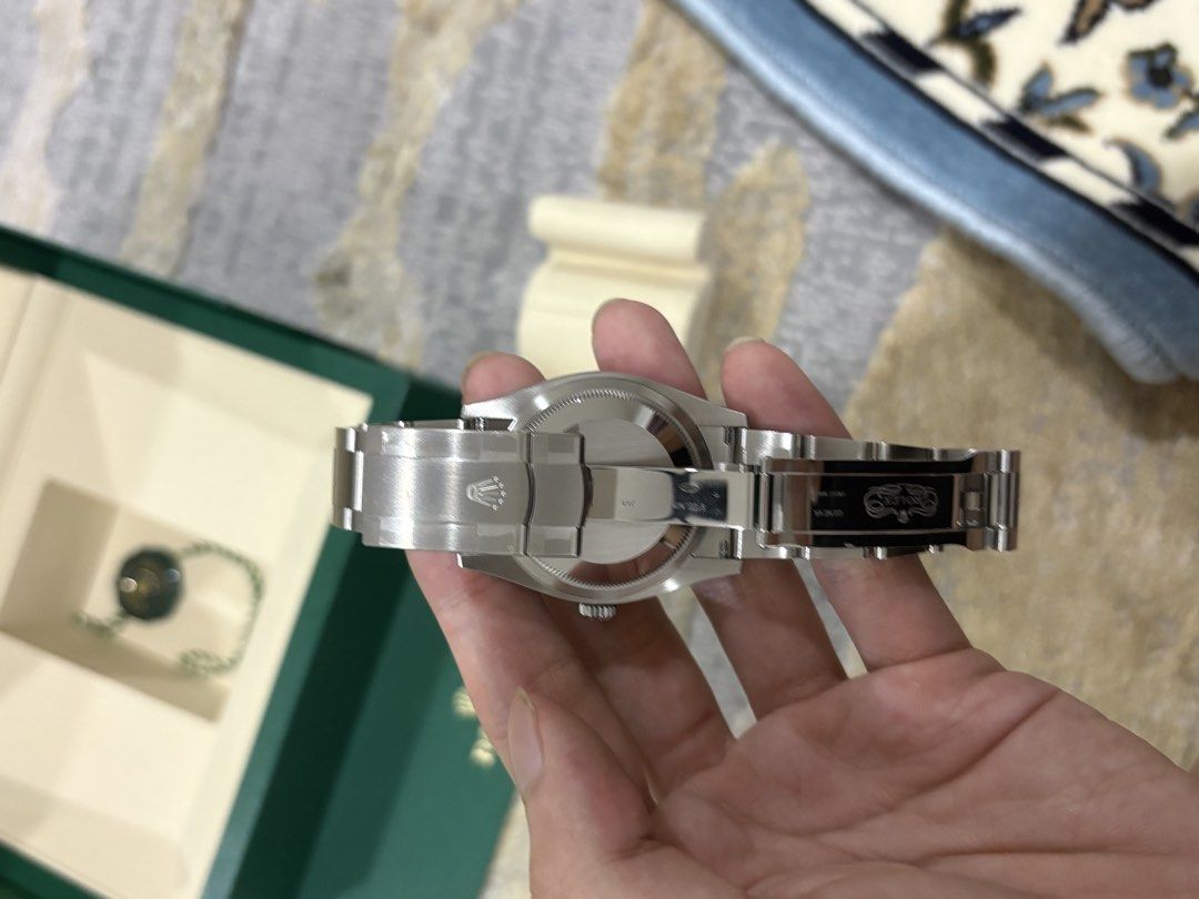 Rolex Oyster Perpetual 126000 Black Dial (Category: Watches) located in Singapore. Submitted by dogeater8277 (Listing ID 1459287371, Image 3). Description: - Rolex Oyster Perpetual Watch - Model: 126000 - Dial Colour: Black - Purchase Date: 19-03-2026 - Includes: Original Box & International Guarantee Card - Condition: Selling as is -up for Nego -can dm for more pictures.