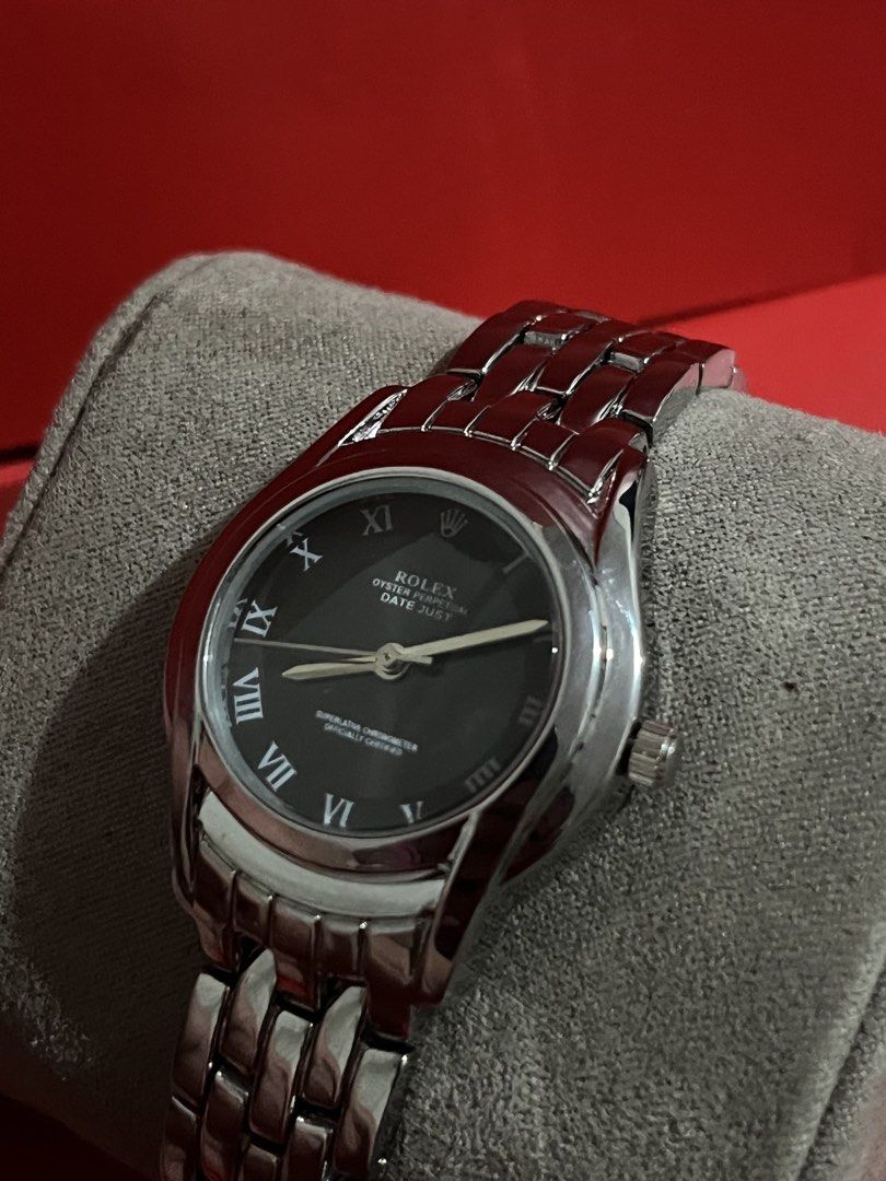 Rolex Oyster Perpetual Datejust Watch (Category: Luxury Watches) located in Manila. Submitted by annesabiniano (Listing ID 1459136192, Image 2). Description: - Rolex Oyster Perpetual Datejust - Classic black dial with Roman numerals - Durable stainless steel band and casing - Excellent running condition - A timeless addition to any watch collection.