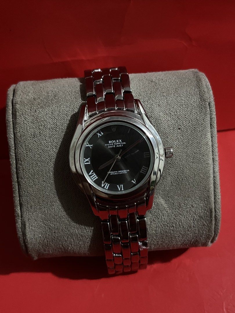 Rolex Oyster Perpetual Datejust Watch (Category: Luxury Watches) located in Manila. Submitted by annesabiniano (Listing ID 1459136192, Image 1). Description: - Rolex Oyster Perpetual Datejust - Classic black dial with Roman numerals - Durable stainless steel band and casing - Excellent running condition - A timeless addition to any watch collection.