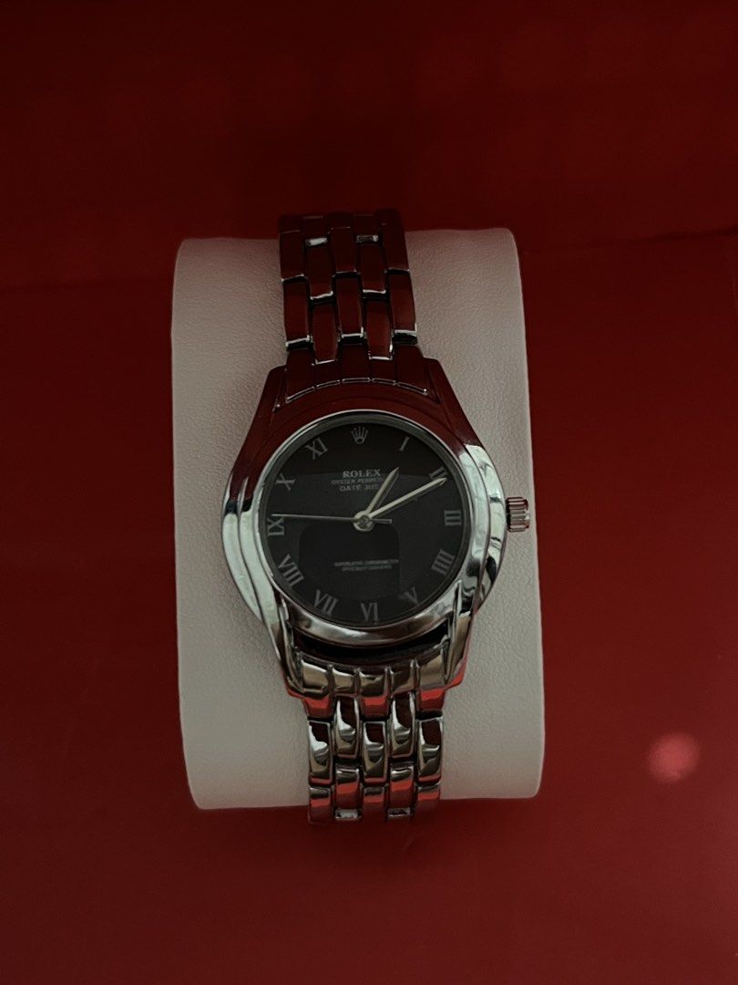 Rolex Oyster Perpetual Datejust Watch (Category: Luxury Watches) located in Manila. Submitted by annesabiniano (Listing ID 1459137361, Image 1). Description: - Rolex Oyster Perpetual Datejust - Classic black dial with Roman numerals - Durable stainless steel band - Reliable quartz movement.