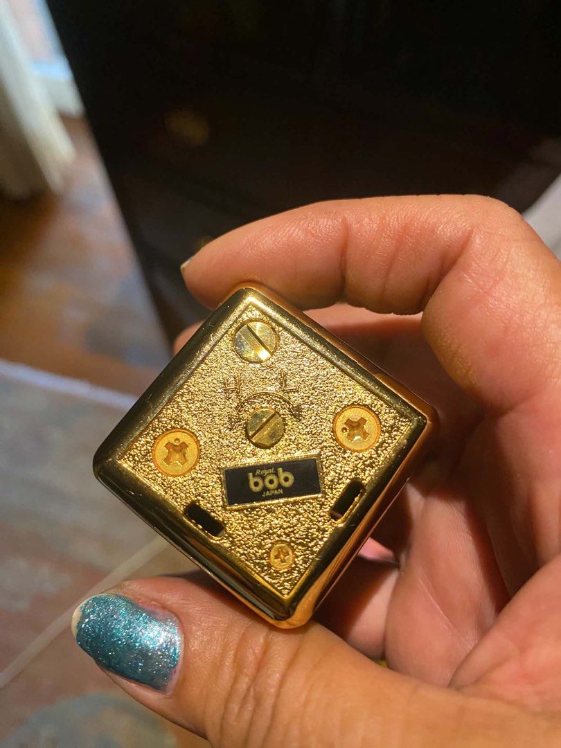Ronson Bob Japan Gold Lighter with Box (Category: Vintage Collectibles) located in Manila. Submitted by batmantr (Listing ID 1459284469, Image 2). Description: - Vintage Ronson Bob lighter - Gold tone finish with wood-like inlay - Made in Japan - Comes with original box - Excellent collectible piece - Suitable for display or practical use.