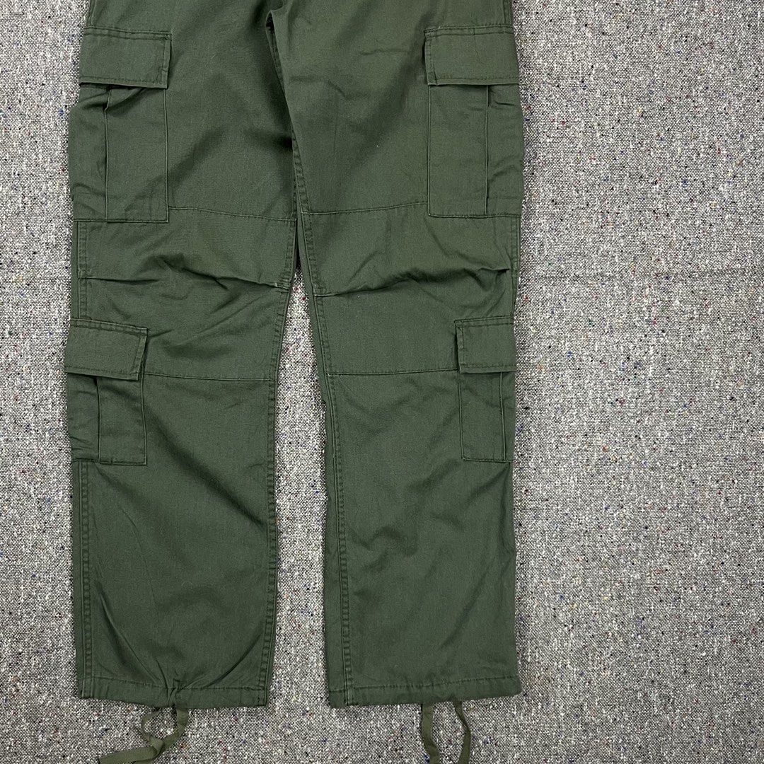 Rothco BDU Tactical Cargo Pants (Olive Green) (Category: Activewear) located in Zamboanga. Submitted by deconstrukt.fit (Listing ID 1459160353, Image 3). Description: Rothco BDU Tactical Cargo Pants (Olive Green) Classic 6-Pocket Layout Includes two deep front slash pockets, two button-down rear flap pockets, and two large pleated side cargo pockets with flap closures for secure storage. A timeless utilitarian piece perfect for rugged outdoor act