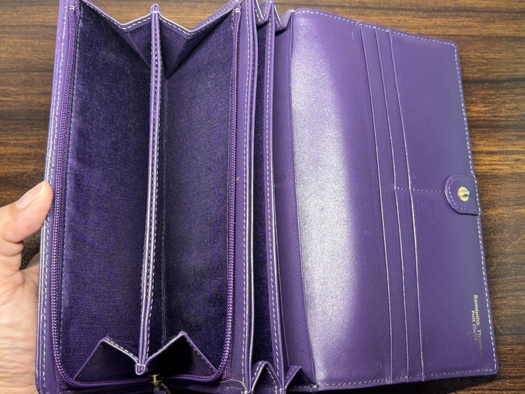 Samantha Thavasa Wallet (Category: Wallets & Card holders) located in Davao. Submitted by luvatpursesight (Listing ID 1459137757, Image 3). Description: Samantha Thavasa Petit Choice Wallet. Mettalic deep purple long wallet with embossed ribbon pattern and bow accent on the front. Unused with box. .