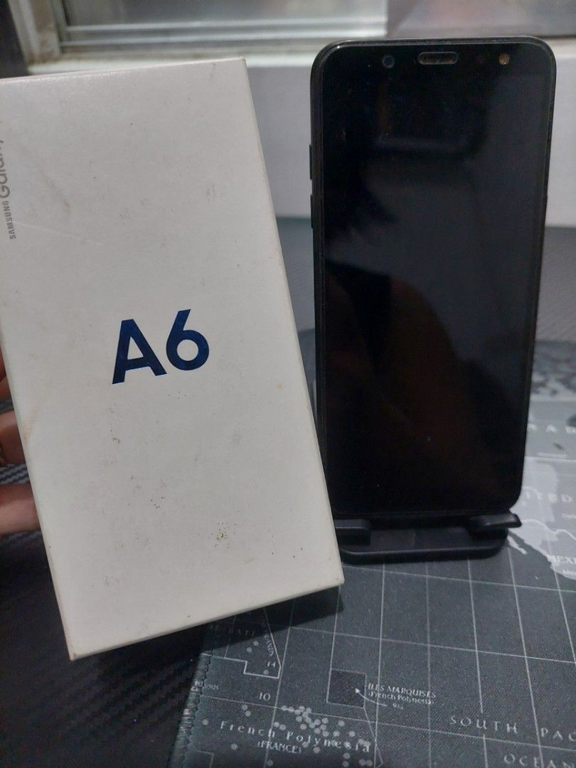 Samsung A6 Smartphone (Preloved) (Category: Samsung) located in Navotas City. Submitted by venizianess (Listing ID 1459151176, Image 2). Description: Php3299 Samsung A6 smartphone, WORKING, NO ISSUES, just stored Hard case, tempered glass with box, no cable/charger, needs micro usb smart sim locked See images for specs from gsmarena Ideal for daily use, spare phone FREE SHIPPING within Metro Manila (no rush), but pref self pick up to check unit -
