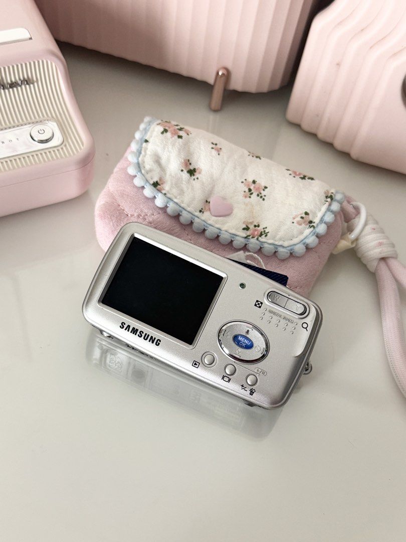 Samsung Digimax U-CA505 Silver Digital Camera Digicam (Category: Cameras) located in Marilao. Submitted by toutlemonde (Listing ID 1459260305, Image 2). Description: - 5.2 MP CCD sensor - 3x optical zoom - can take photos and videos - 9/10 cosmetic condition - uses SD card (not included) Issue: flash was recently working (as shown in the actual photo posted) but suddenly stopped working. the flash may need a battery replacement/repair to work aga