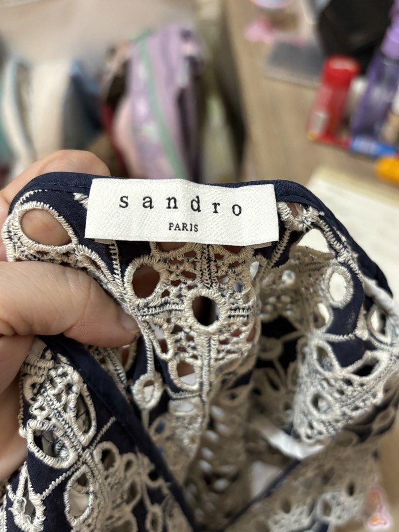 Sandro Paris Navy Lace Flutter Sleeve Dress (Category: Dresses) located in Pasig City. Submitted by k8s_charm_est.2021 (Listing ID 1459189581, Image 2). Description: Small to semi M L: 32 inches - Navy blue Sandro Paris dress - Intricate lace overlay - Flutter sleeves - V-neckline with drawstring waist - Flared hemline - Ideal for parties or a night out - Includes original packaging.