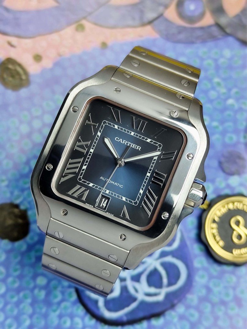 Santos Large Blue Dial (Category: Men's Watches) located in Makati City. Submitted by swissperpetual (Listing ID 1459117685, Image 2). Description: Cartier Santos De Cartier Blue Dial Large 39.8 x 47.5 mm WSSA0013 2019 Complete set (-2 Links) Condition: 9/10 (Excellent condition) Price: P438,000 Negotiable 🤝 7 Day Moneyback Guarantee 🧑‍🔧 1 Year SP Service Warranty 💱 Trades Offers and Pre-orders Accepted 💳 Credit Card Options Available 🪙 Lay