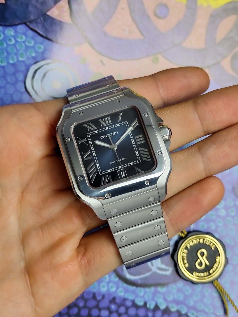 Santos Large Blue Dial (Category: Men's Watches) located in Makati City. Submitted by swissperpetual (Listing ID 1459117685, Image 1). Description: Cartier Santos De Cartier Blue Dial Large 39.8 x 47.5 mm WSSA0013 2019 Complete set (-2 Links) Condition: 9/10 (Excellent condition) Price: P438,000 Negotiable 🤝 7 Day Moneyback Guarantee 🧑‍🔧 1 Year SP Service Warranty 💱 Trades Offers and Pre-orders Accepted 💳 Credit Card Options Available 🪙 Lay