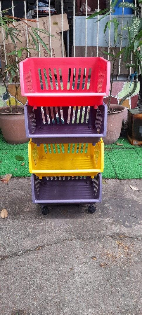 Set of 4 Stackable Storage Baskets with Wheels (Category: Storage Boxes & Baskets) located in Valenzuela. Submitted by newbear.425b6e (Listing ID 1459119906, Image 1). Description: - Set of 4 colorful storage baskets - Colors include: Red, Purple, Yellow, and another Purple - Stackable design for space-saving storage - 2 baskets feature wheels for easy transport - Ideal for organizing toys, books, and various items -surplus 900 only..