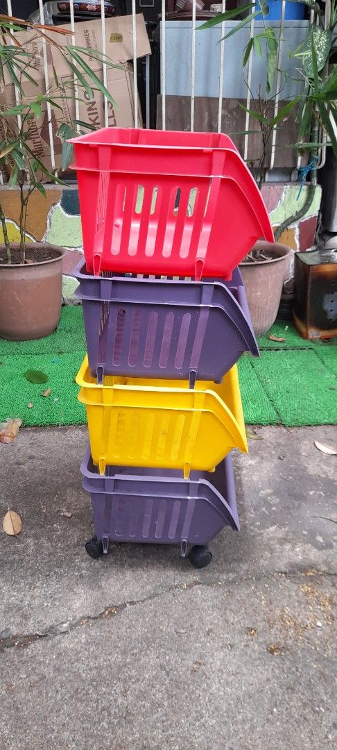 Set of 4 Stackable Storage Baskets with Wheels (Category: Storage Boxes & Baskets) located in Valenzuela. Submitted by newbear.425b6e (Listing ID 1459119906, Image 3). Description: - Set of 4 colorful storage baskets - Colors include: Red, Purple, Yellow, and another Purple - Stackable design for space-saving storage - 2 baskets feature wheels for easy transport - Ideal for organizing toys, books, and various items -surplus 900 only..