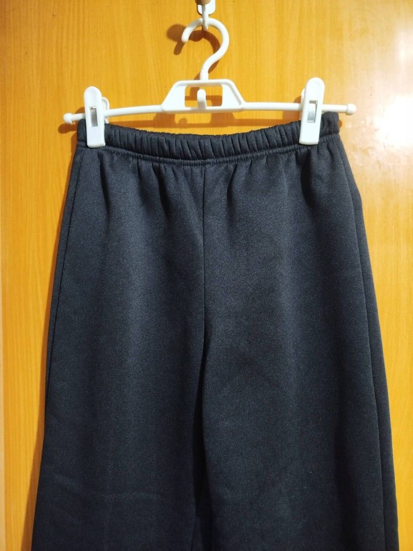 SHEIN Black Jogger Pants Size 11Y (Category: Other Bottoms) located in Quezon City. Submitted by niceoutfits (Listing ID 1459269400, Image 2). Description: - Brand: SHEIN - Type: Jogger Pants - Color: Black - Size: 11 Years (11Y) - Waist : 24-28 inches - Length : 34 inches - Material: 100% Polyester - Features: Elastic waistband, cuffed ankles - Ideal for: Casual wear, lounging - Care: Easy to wash and maintain.