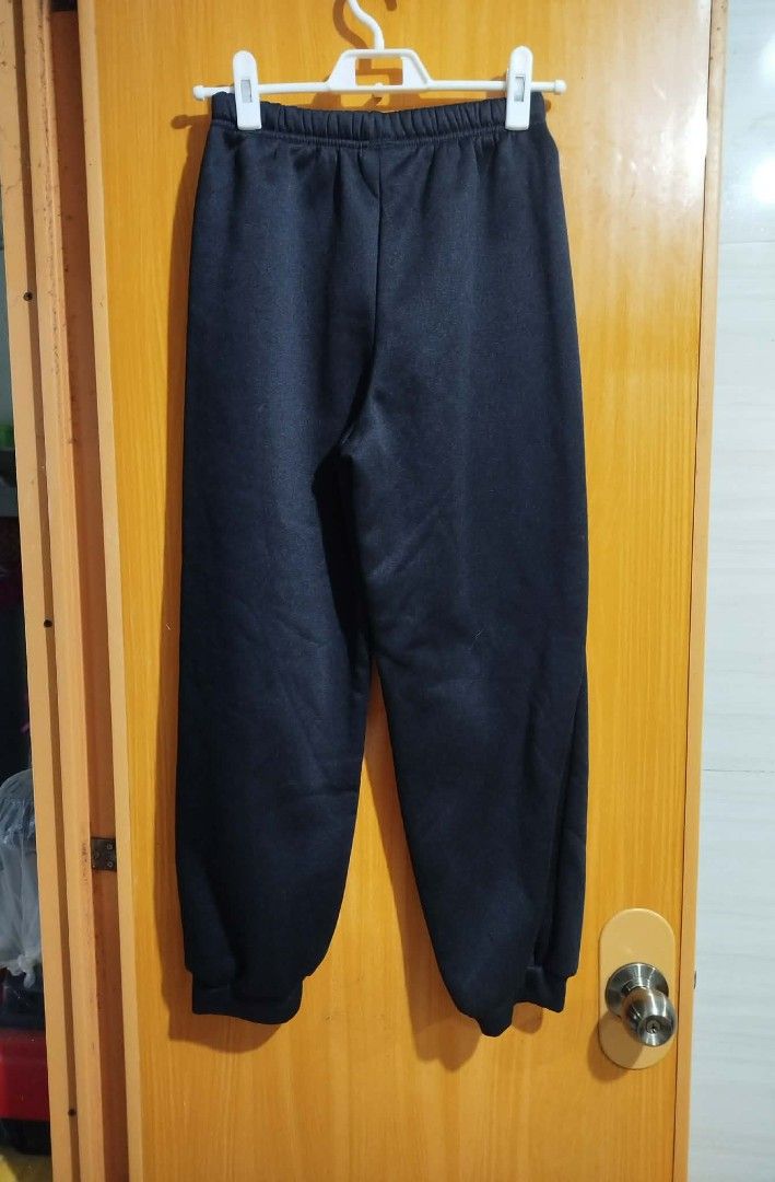 SHEIN Black Jogger Pants Size 11Y (Category: Other Bottoms) located in Quezon City. Submitted by niceoutfits (Listing ID 1459269400, Image 3). Description: - Brand: SHEIN - Type: Jogger Pants - Color: Black - Size: 11 Years (11Y) - Waist : 24-28 inches - Length : 34 inches - Material: 100% Polyester - Features: Elastic waistband, cuffed ankles - Ideal for: Casual wear, lounging - Care: Easy to wash and maintain.