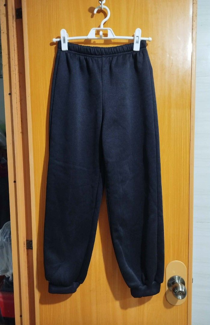 SHEIN Black Jogger Pants Size 11Y (Category: Other Bottoms) located in Quezon City. Submitted by niceoutfits (Listing ID 1459269400, Image 1). Description: - Brand: SHEIN - Type: Jogger Pants - Color: Black - Size: 11 Years (11Y) - Waist : 24-28 inches - Length : 34 inches - Material: 100% Polyester - Features: Elastic waistband, cuffed ankles - Ideal for: Casual wear, lounging - Care: Easy to wash and maintain.