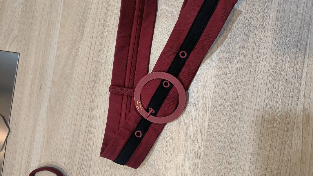 Solid & Striped One Piece Swimsuit with Belt (Category: Bikinis & Swimsuits) located in Makati City. Submitted by fashion_thrift_ (Listing ID 1459288870, Image 3). Description: Maroon one-piece swimsuit from Solid & Striped. Comes with a matching belt that has a circular buckle. The belt has black stripes and button details. Straps are thin spaghetti straps. Back is a racerback style. Great for the beach or pool..