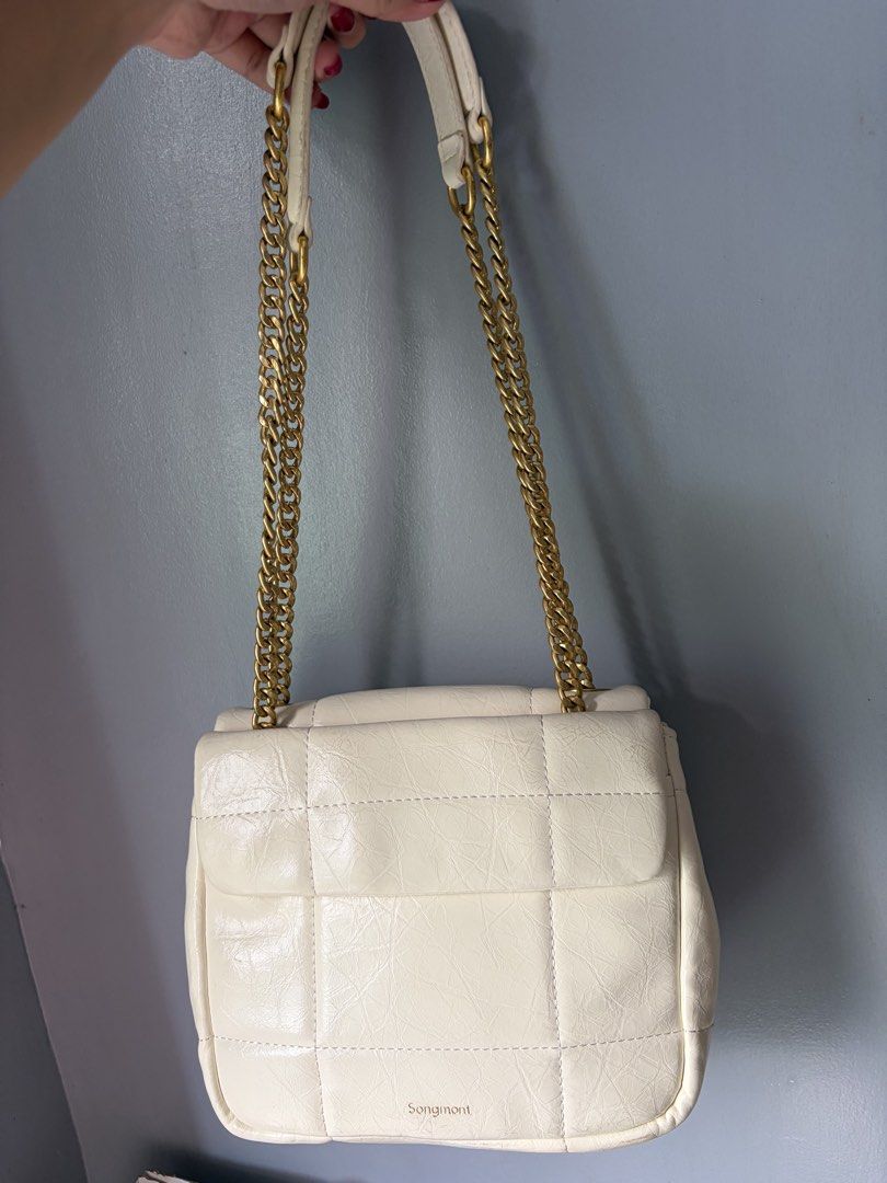 Songmont Small Chocolate Bag in Ivory (Category: Luxury Bags & Wallets) located in Tacloban City. Submitted by thebigbagtheory (Listing ID 1459246799, Image 3). Description: - Songmont Small Chocolate Bag - Color: Ivory - Quilted design - Gold chain strap - Unique gold buckle closure - Ideal for everyday use -expect signs of usage since its preloved.