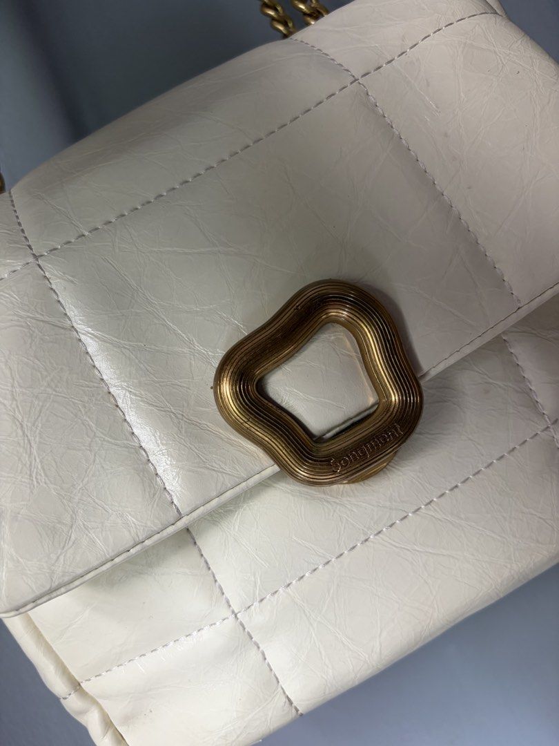 Songmont Small Chocolate Bag in Ivory (Category: Luxury Bags & Wallets) located in Tacloban City. Submitted by thebigbagtheory (Listing ID 1459246799, Image 2). Description: - Songmont Small Chocolate Bag - Color: Ivory - Quilted design - Gold chain strap - Unique gold buckle closure - Ideal for everyday use -expect signs of usage since its preloved.