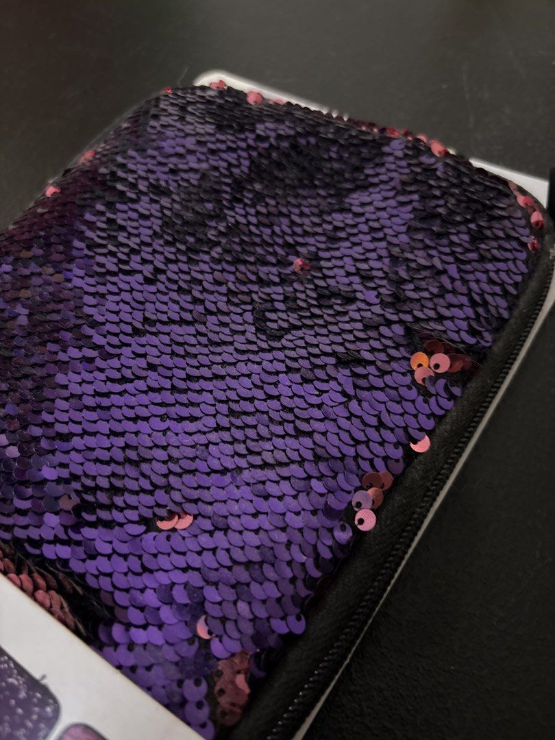 Sparkle Sequin Tablet Case Fits Most 8" Tablets Bonus Carry Strap (Category: Cases & Sleeves) located in Malabon City. Submitted by luxgoals (Listing ID 1459277690, Image 2). Description: - Fits most 8-inch tablets - Reversible sequins: purple to pink - Bonus carry strap included - Stylish protection for your tablet.