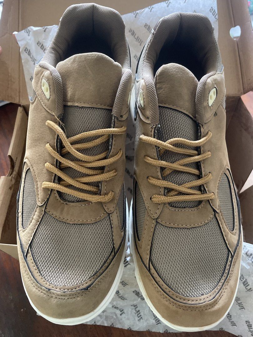 NEW 💯 Sprint LOKI - Brown/Tan (Category: Casual Shoes) located in Quezon City. Submitted by romsr (Listing ID 1459137557, Image 2). Description: USED ONCE FOR PHOTOSHOOT - Trendy brown and tan sneakers - Chunky white sole for a modern look - Secure lace-up closure - Breathable mesh panels keep your feet cool - Ideal for everyday casual wear - Comes with original box.