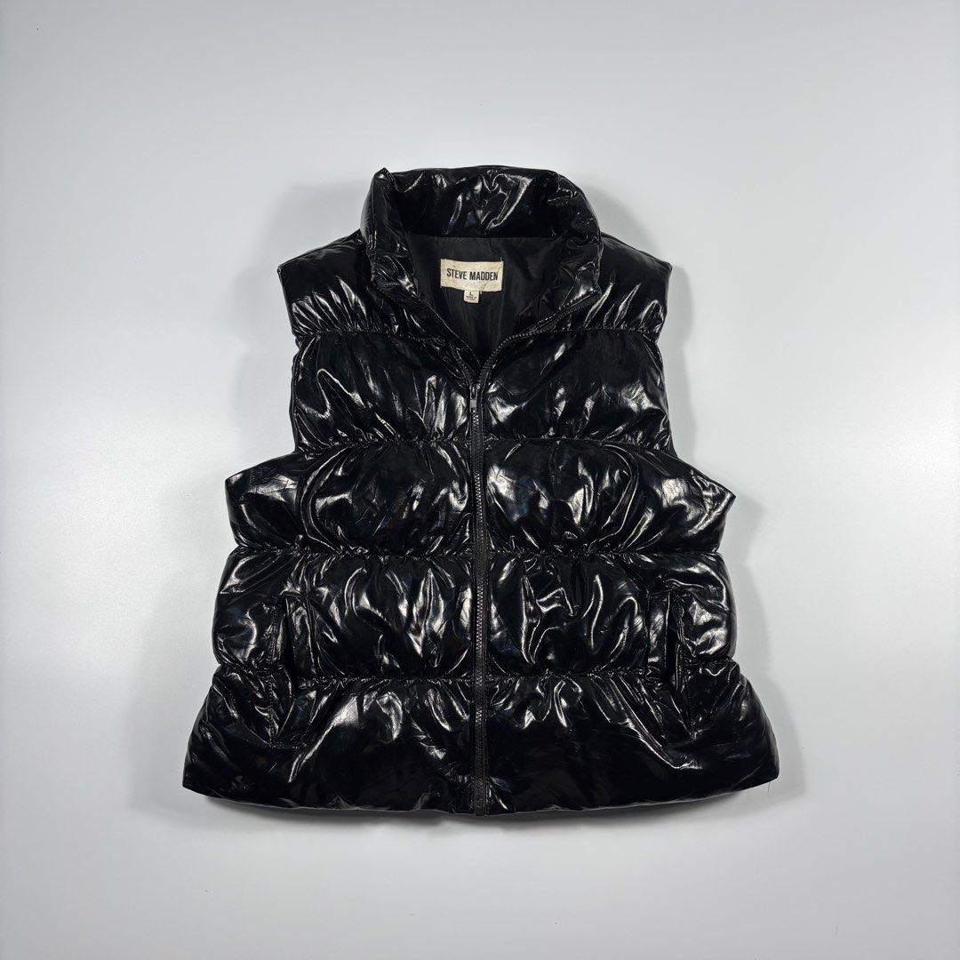 STEVE MADDEN BLACK LEATHER PUFFER VEST (Category: Coats, Jackets and Outerwear) located in Bulacan. Submitted by etolleneil (Listing ID 1459111564, Image 1). Description: Size: Best fit SMALL Dimes: SEE COMSEC. Color rate: 9/10 Issue: NONE.