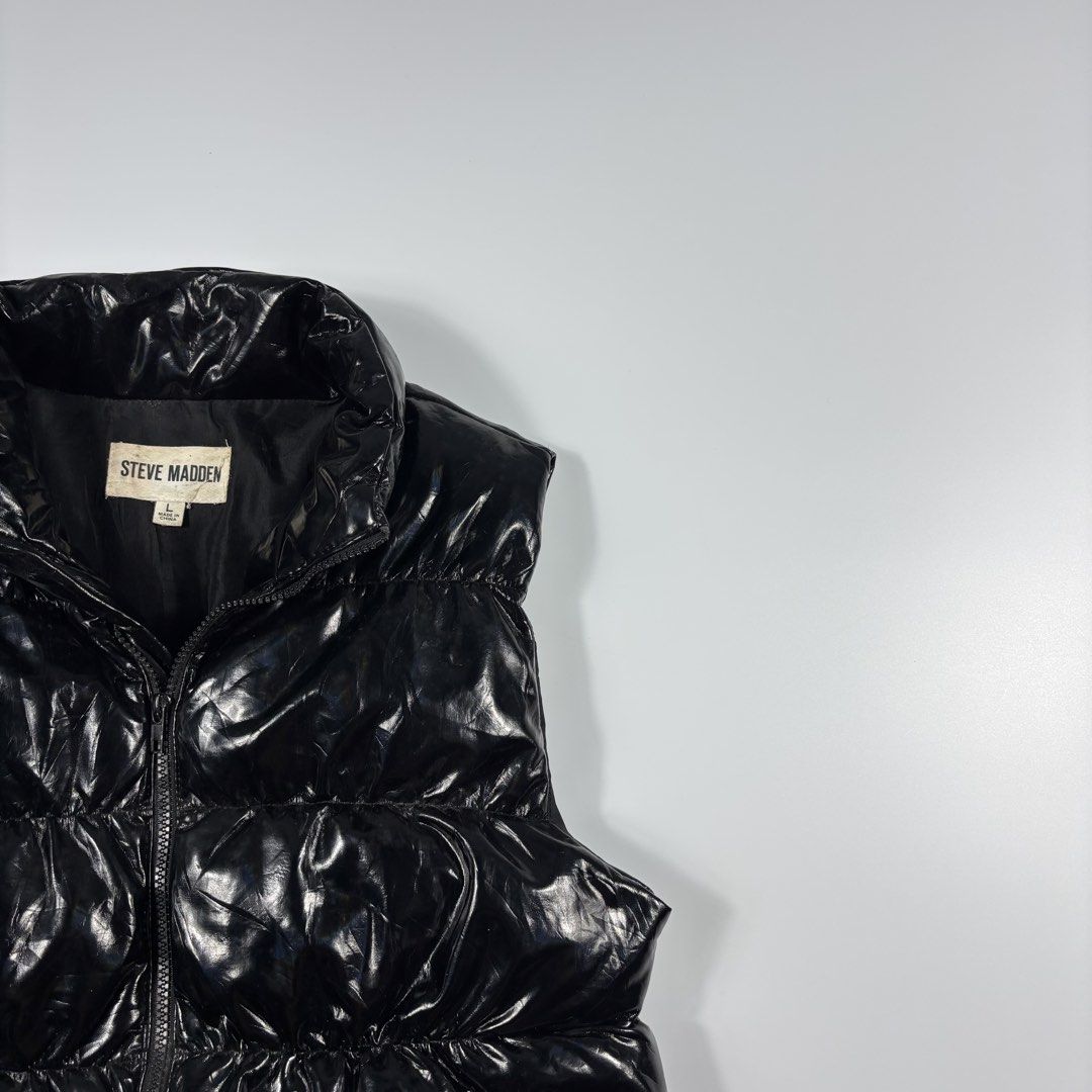 STEVE MADDEN BLACK LEATHER PUFFER VEST (Category: Coats, Jackets and Outerwear) located in Bulacan. Submitted by etolleneil (Listing ID 1459111564, Image 3). Description: Size: Best fit SMALL Dimes: SEE COMSEC. Color rate: 9/10 Issue: NONE.