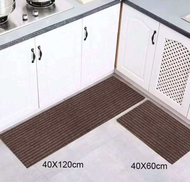 Striped Kitchen Runner Rug Set - 2 Pieces (Category: Carpets, Mats & Flooring) located in Caloocan City. Submitted by swiftflower_802790 (Listing ID 1459188524, Image 3). Description: - Set includes one long runner and one smaller mat. - Features a classic striped pattern. - Available in three stylish colors: grey, maroon, or brown. - Ideal for use in the kitchen or entryway. - Easy to clean and maintain. - Helps protect your floors from spills a