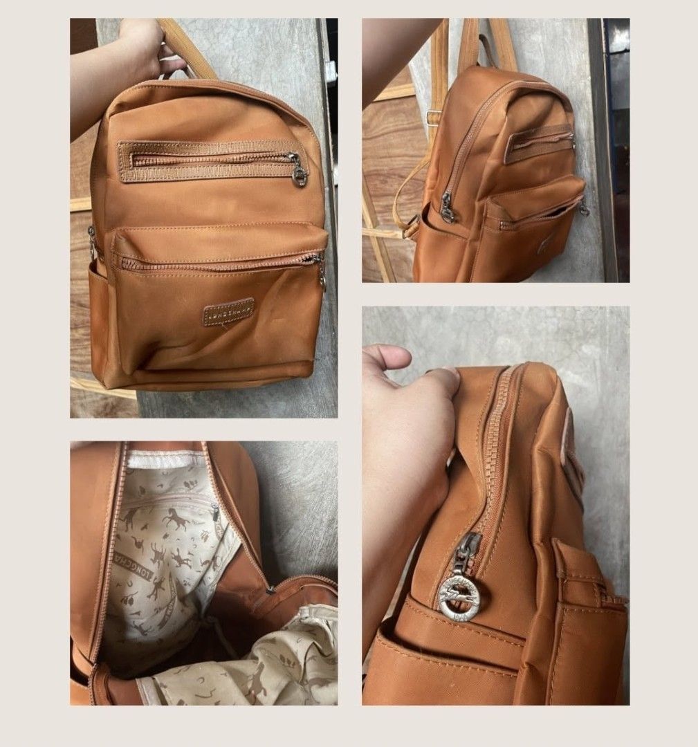 Tan Nylon Multi-Pocket Backpack (Longchamp Style) - Preloved (Category: Luxury Bags & Wallets) located in Malabon City. Submitted by naughty_09 (Listing ID 1459131546, Image 1). Description: ​Color: Light Brown / Tan ​Material: Durable Nylon Fabric ​Condition: Preloved / Good condition (Smooth zippers, complete hardware) ​Details: ​Multi-pocket design (front & side pockets for easy organization) ​Printed interior lining with zipper pull details ​
