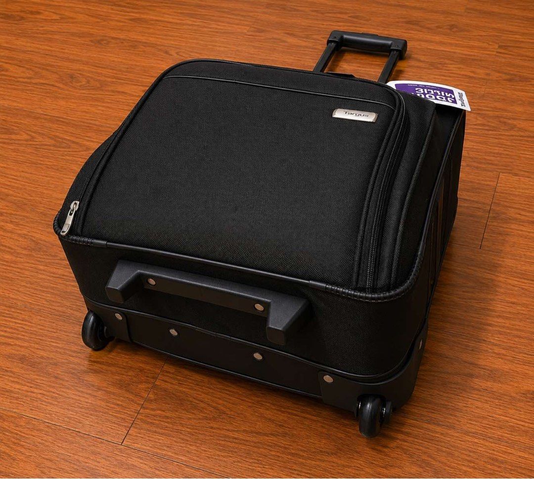 Targus Rolling Case for 15.6" Laptop (Category: Laptop Bags & Sleeves) located in Pasig City. Submitted by frusciantenism (Listing ID 1459090868, Image 3). Description: - Targus rolling laptop case - Fits laptops up to 15.6 inches - Ideal for travel and work - Features wheels and a retractable handle for easy maneuverability - Spacious interior for all your essentials - Brand new with tags still attached - Price is negotiable, just ask nicely RFS