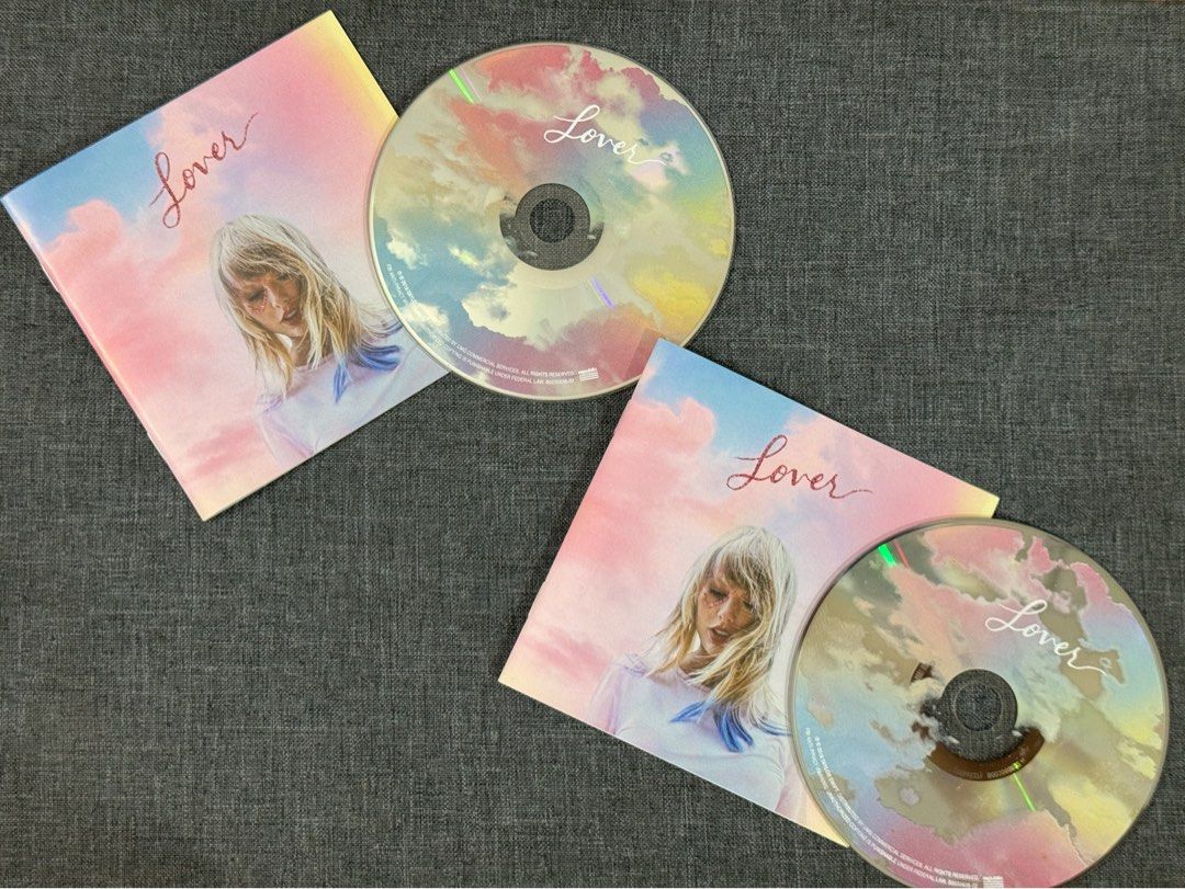 Taylor Swift Lover CD Album (Category: CDs & DVDs) located in Marikina City. Submitted by honeymoonav (Listing ID 1459161715, Image 1). Description: - Taylor Swift Lover CD (Booklet & CD only) from Lover Diaries - Features iconic album art with clouds and 'Lover' title - Includes the CD itself - A must-have for any Swiftie's collection.