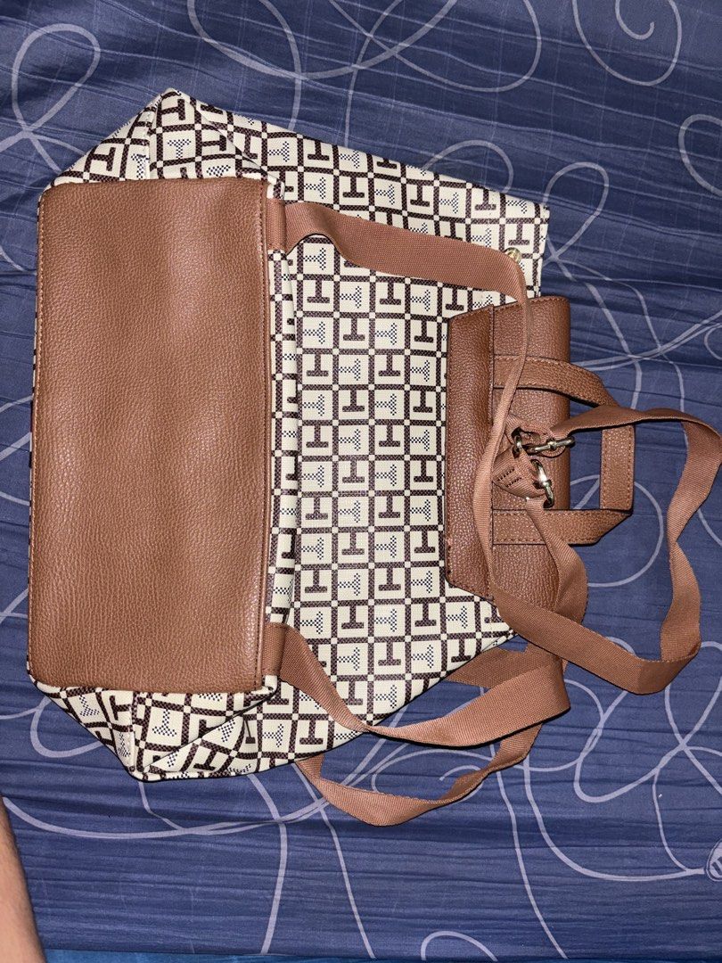 TOMMY HILFIGER Jacquard Monogram Backpack (Category: Backpacks) located in Manila. Submitted by dailyflight_ (Listing ID 1459150489, Image 2). Description: You can do QR code in the backpack tickets if you’re doubting that’s a fake..