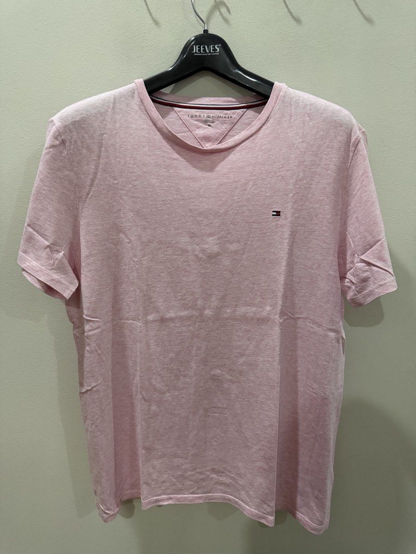 Tommy Hilfiger T-Shirt (Category: Tshirts & Polo Shirts ) located in Pasig City. Submitted by dey2x (Listing ID 1459261672, Image 1). Description: RFS: decluttering -Meetups can be arranged -Delivery via Grab Express/Lalamove/J&T/LBC (c/o buyer) PLEASE TAKE NOTE: This is preowned. Expect signs of usage. NO RETURN POLICY. NO EXCHANGE OF ITEMS..
